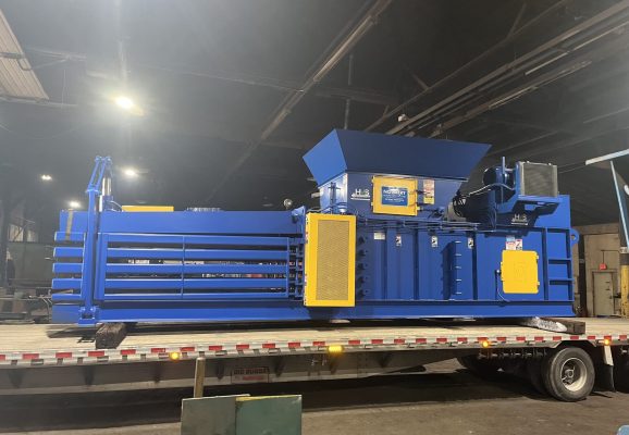 Reconditioned horizontal auto-tie baler rebuilt by HMS technicians