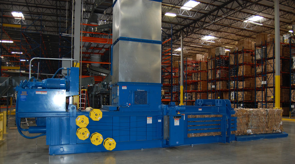 Balemaster EO Series horizontal auto-tie baler processing OCC cardboard at high volume distribution center