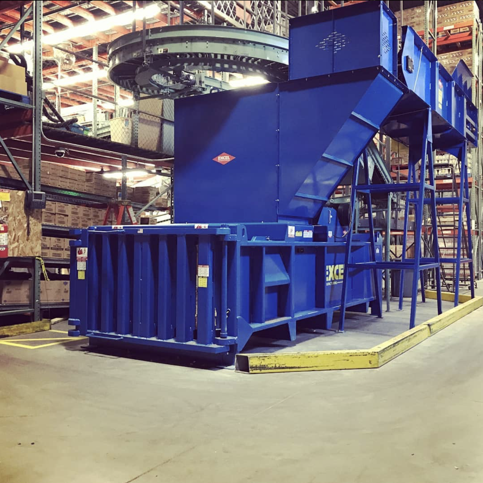 Horizontal closed-door baler for lower volume corrugated cardboard OCC at distribution center