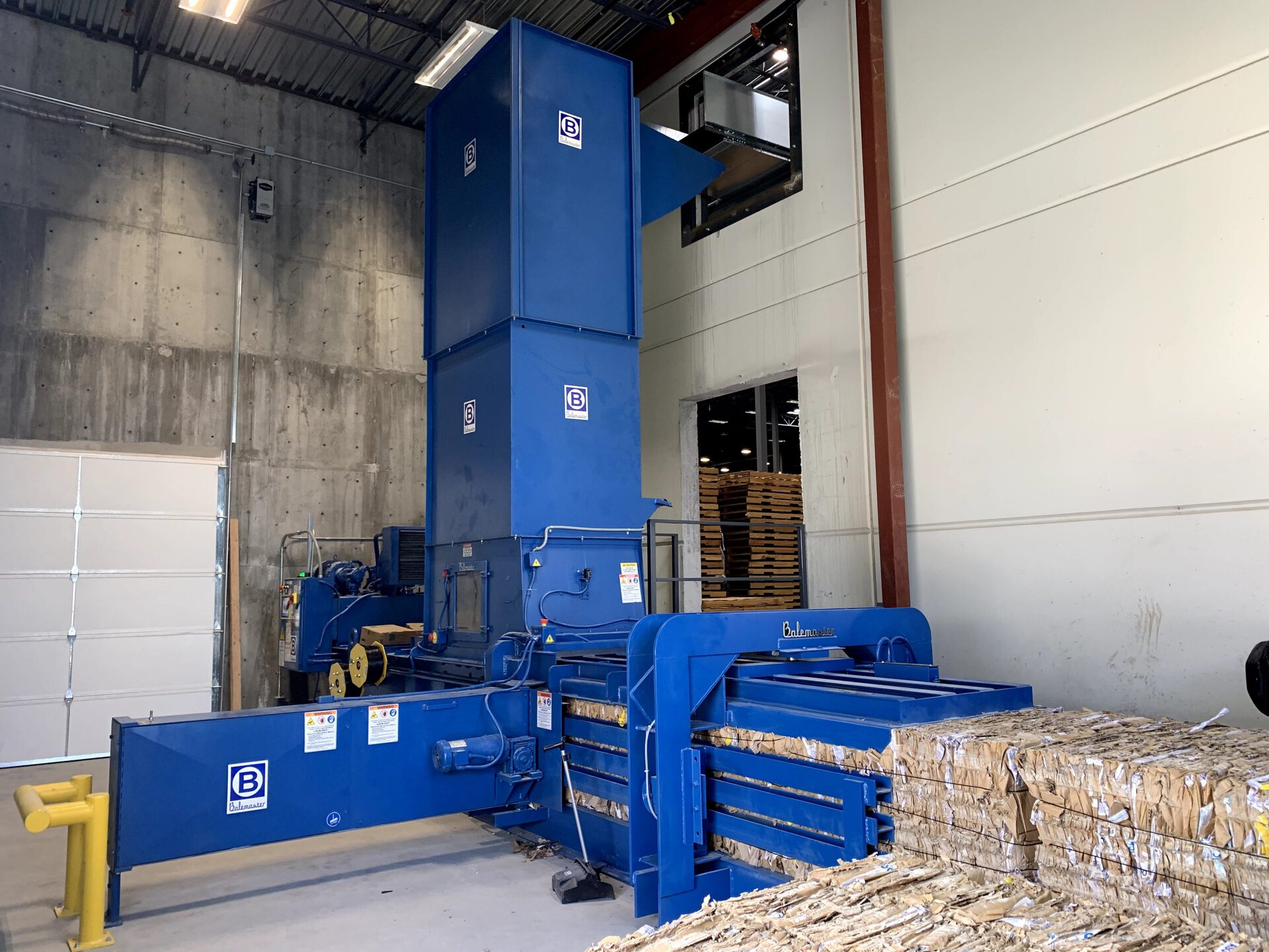 Cardboard baler for distribution center and warehouse recycling operations