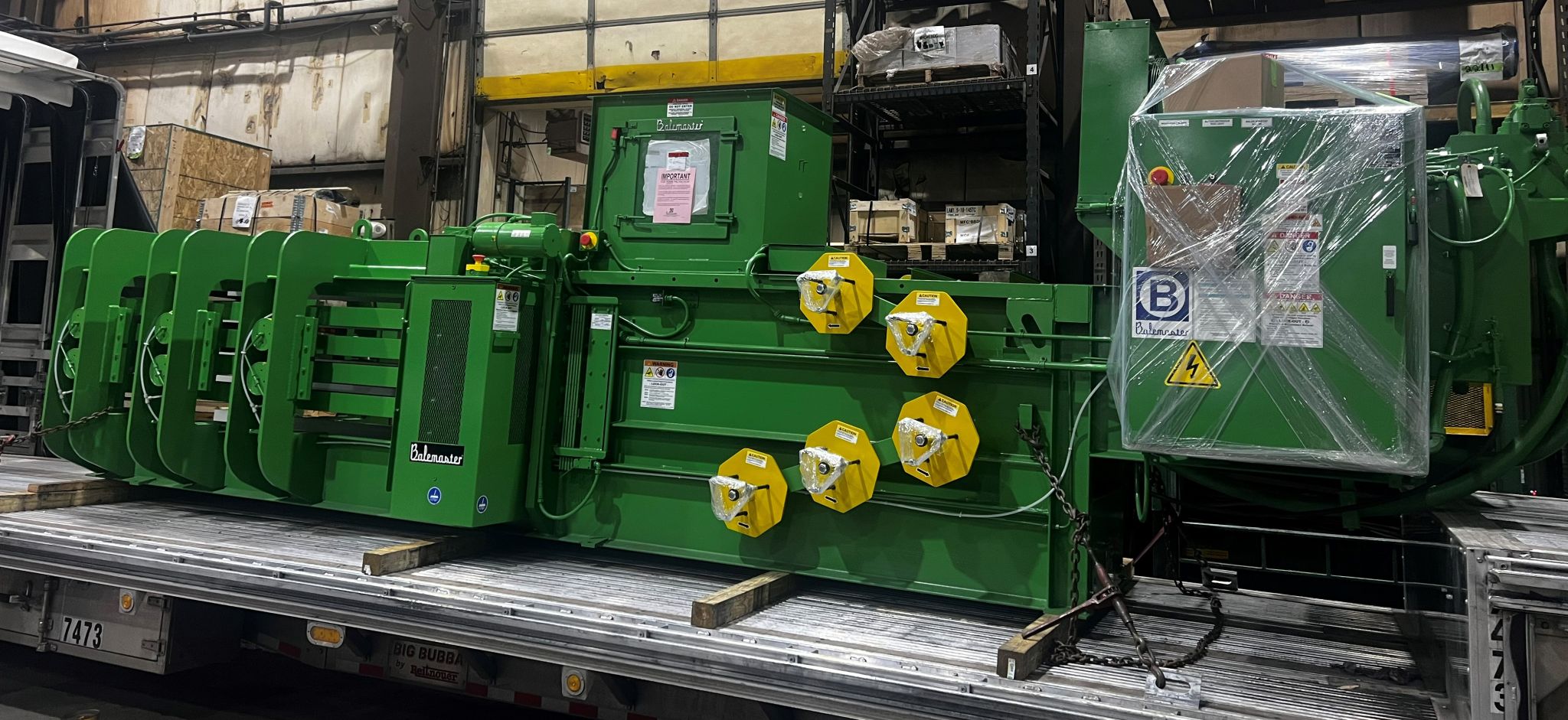 Balemaster E-Series horizontal auto-tie baler for box plant corrugated trim shipping out for installation