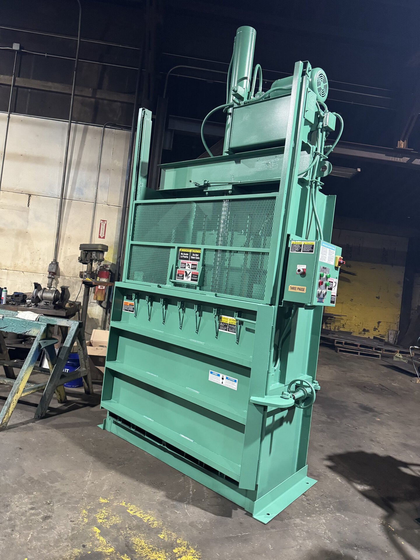 Refurbished vertical baler rebuilt in-house by HMS at Wanatah Indiana facility with 120 day warranty
