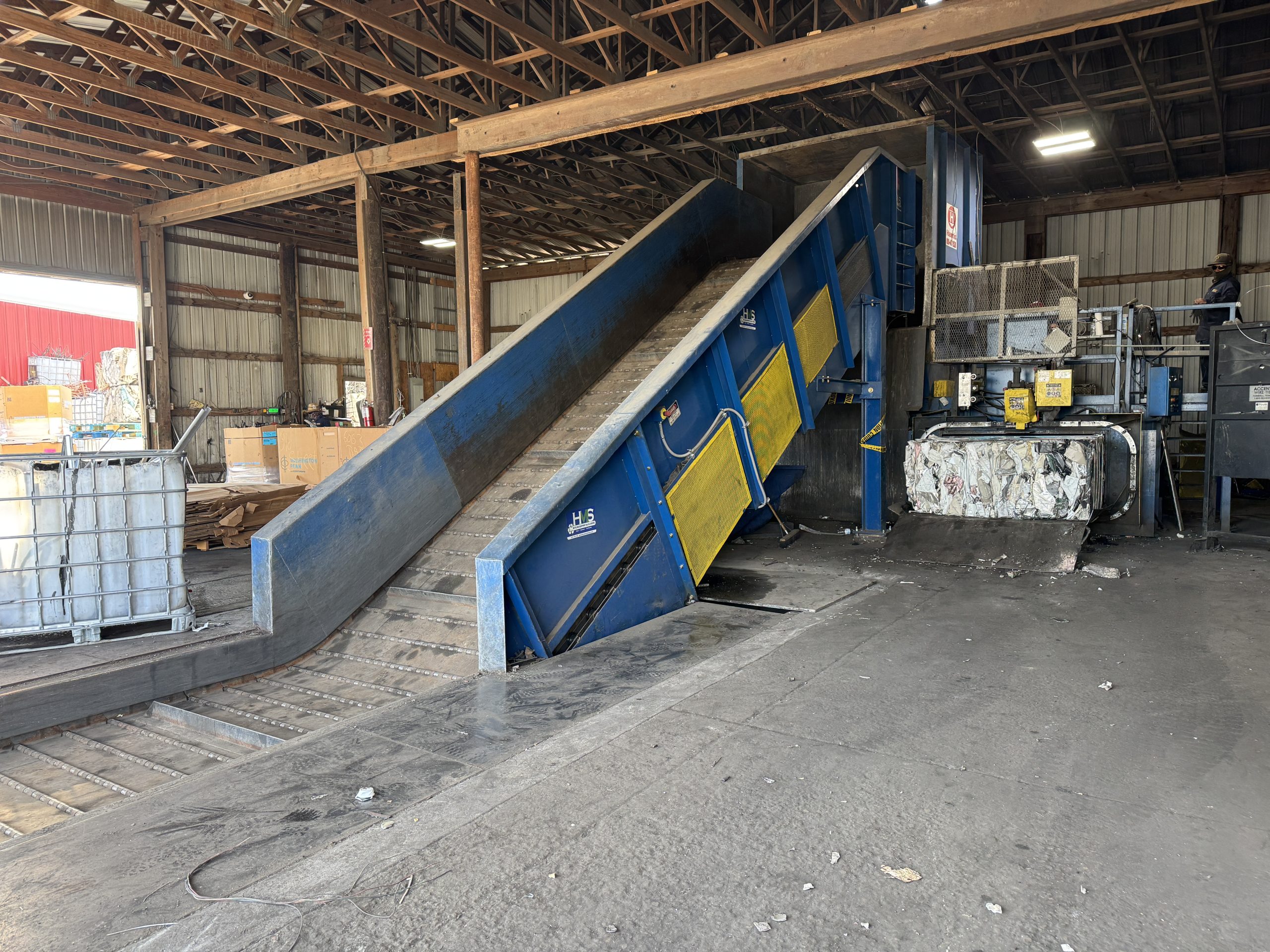Infeed conveyor being added to an existing Harris Badger two ram baler